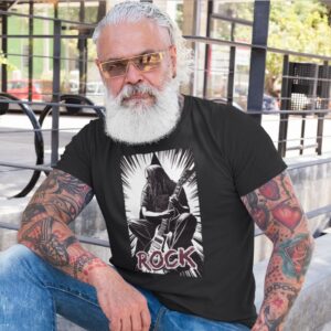 Ein bärtiger Mann in einem Rockin-and-Rollin-Herrenhemd.